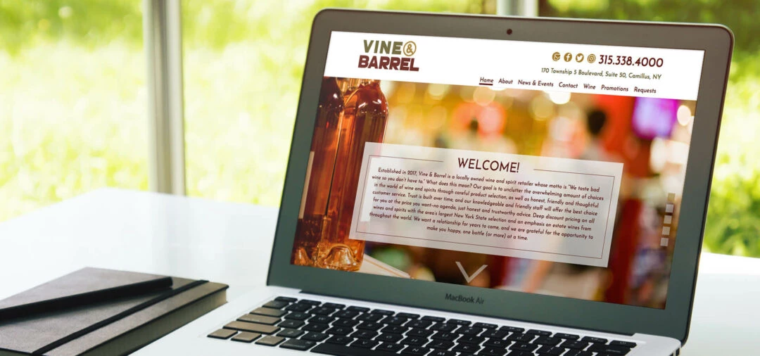 Vine & Barrel Website on Laptop