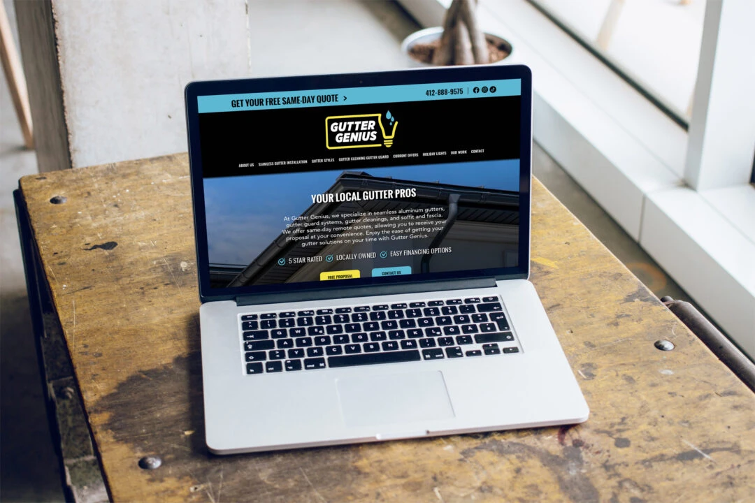 Mockup of the Gutter Genius Website on a Laptop